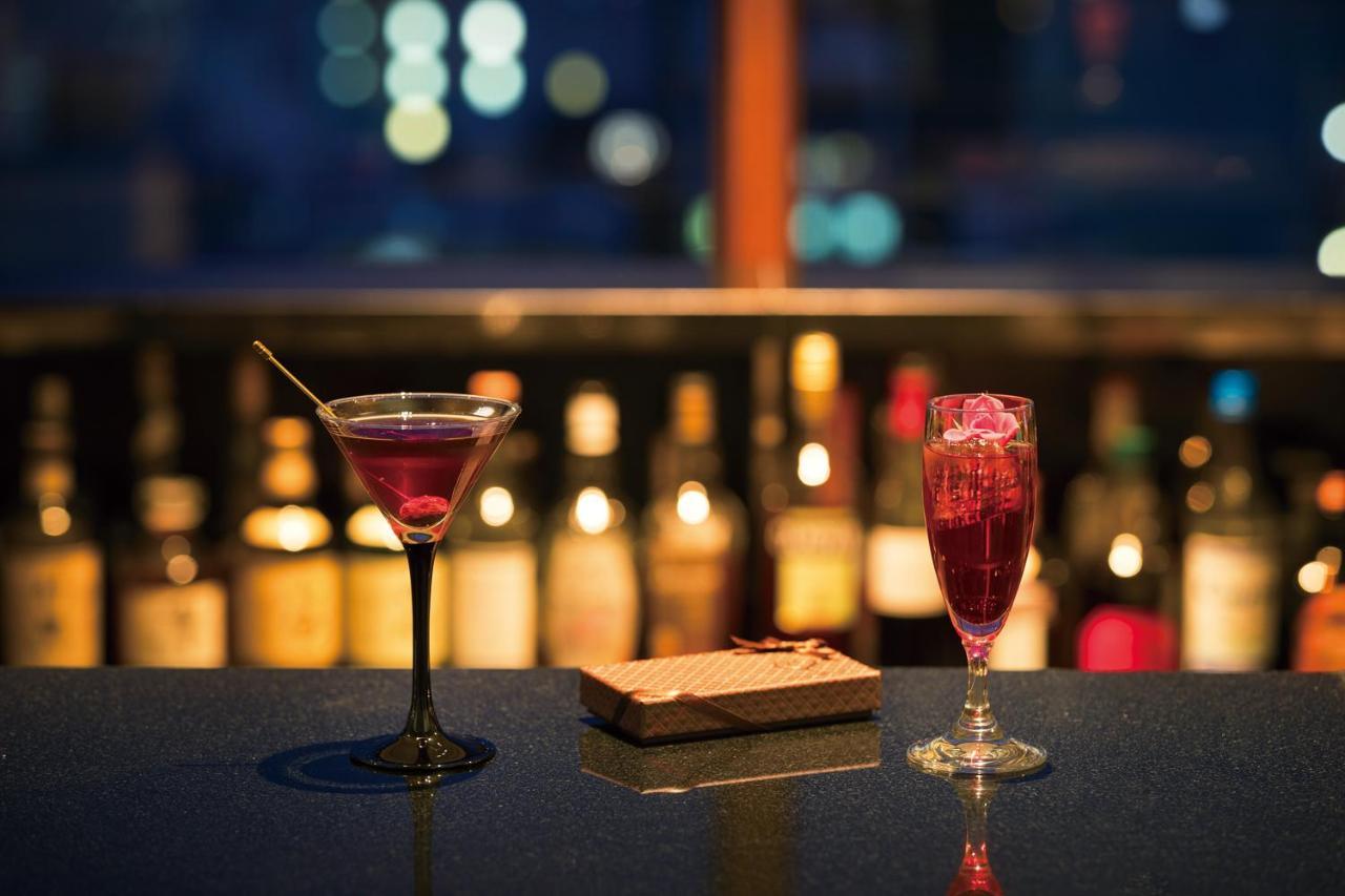 Hotel Associa Shizuoka Buitenkant foto A cosmopolitan (left) and a cosmopolitan float (right)