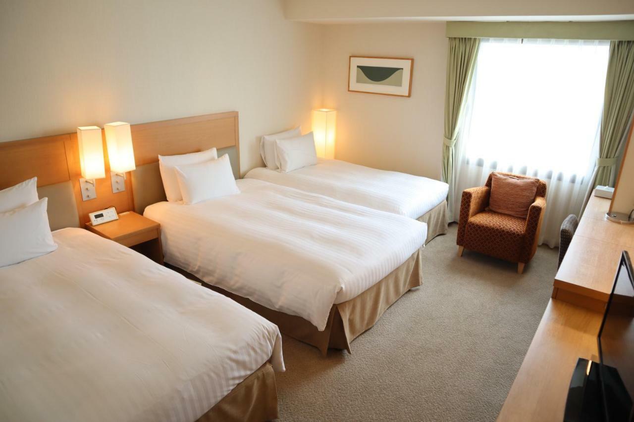 Hotel Associa Shizuoka Buitenkant foto A typical room at the hotel